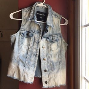 Faded denim vest
